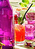 Caipiroska cocktail with strawberries at a summer buffet