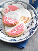 Name biscuits with icing sugar