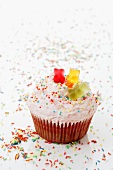 A cupcake decorated with gummy bears