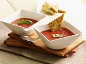 Cream of tomato soup with herb and polenta triangles
