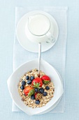 Muesli with berries and milk