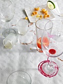 Remains of food and empty glasses on a table