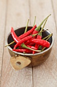 Fresh red chilli peppers in a bowl