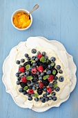 Pavlova with lemon cream and berries