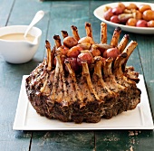 Crown Roast of Pork with Potatoes on a Platter