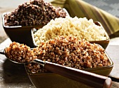 Bowls of Cooked Red, White and Black Quinoa
