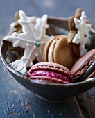 Macaroons and snowflake biscuits in a bowl