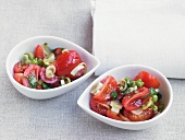 Bowls of tomato salsa with spring onions