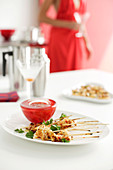Squid skewers with chilli sauce