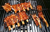 Marinated veal spare ribs on the grill