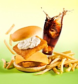 Fish Sandwich, Fries and a Soda; Spilling