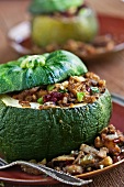 Acorn Squash Stuffed with Dried Cranberry, Apple Cinnamon and Corn Muffin Stuffing