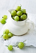 Gooseberries in a white pitcher