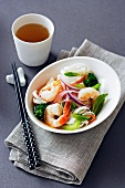 Shrimp and Vegetables Over Rice Noodles; Chopsticks