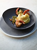 Coconut and potato puree with spring onions and chilli shrimps