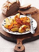 Fried potatoes with bacon