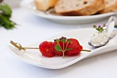 Skinned cocktail tomatoes on stick