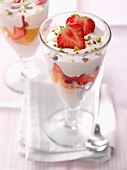 Mascarpone cream with orange shortbreads, strawberries and pistachios