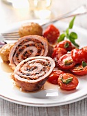 Stuffed veal roulade with a warm tomato salad