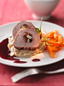 Stuffed pork fillet on black salsify puree with a red wine sauce and a carrot salad