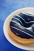 A doughnut with a mint-chocolate glaze