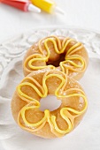 Two decorated doughnuts