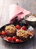 Beef steak fillet with a bread crust and cherry tomatoes
