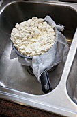 Cheese Draining in Cheesecloth