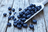 Blueberries on a wooden scoop