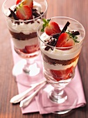 Lime cream with strawberries and chocolate sponge