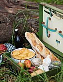 An autumn picnic with bread, spreads and bakes in a picnic hamper
