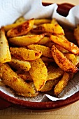 Spicy fried potato wedges