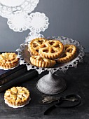 Small apple tartlets with heart-shaped decoration