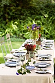 A table laid for a meal in the garden