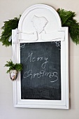 Festively decorated slate chalkboard