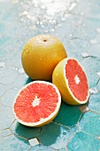 Grapefruits, whole and halved