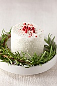 Crottin de Cavignole (French goat's cheese) with rosemary and pepper