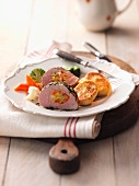 Stuffed pork loin and potato cakes