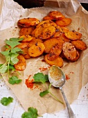 Spicy carrot slices on baking paper