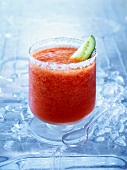 Frozen Bloody Mary with a slice of cucumber
