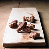 Jerusalem artichokes on a wooden board