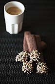 Cocoa biscuits with chopped hazelnuts and an espresso