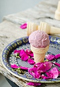 Rose ice cream in a cone