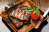 Grilled steak with a tomato