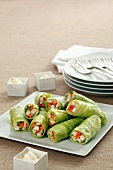Lettuce rolls filled with chicken and carrots with mayonnaise