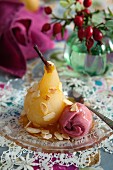 Poached pear with flaked almonds and raspberry sorbet