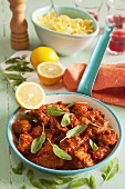 Veal meatballs with lemon and sage in tomato sauce