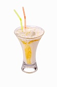 An apricot shake with two straws