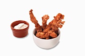 Fried chicken strips with a sour cream dip