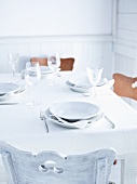 A table laid in white